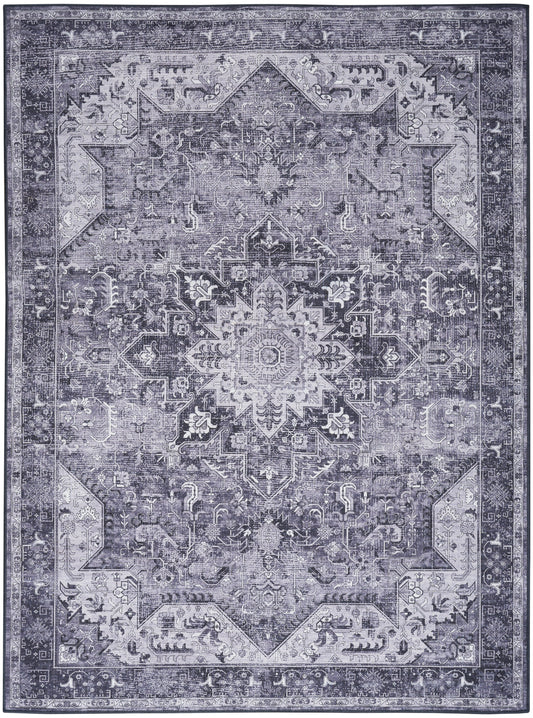 Rectangular vintage blue-gray rug with a distressed oriental medallion centerpiece and ornate floral border.