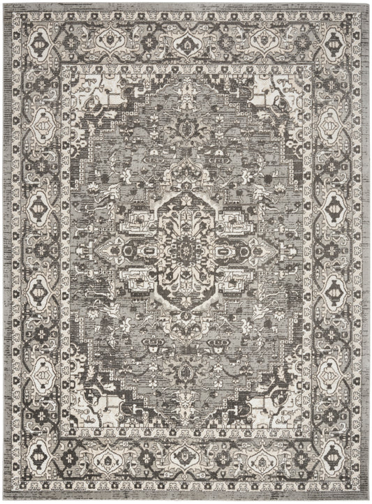 Gray and beige Persian-style rug with a detailed central medallion and ornate border.