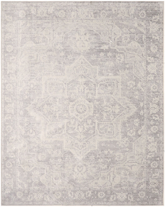 Ivory-gray distressed oriental rug with central medallion and ornate border, soft faded finish.