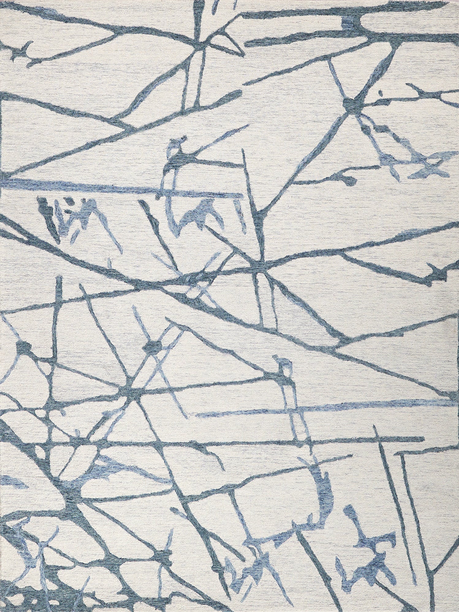 Ivory rug with abstract blue-gray branch-like lines forming intersecting geometric pattern; modern decor.
