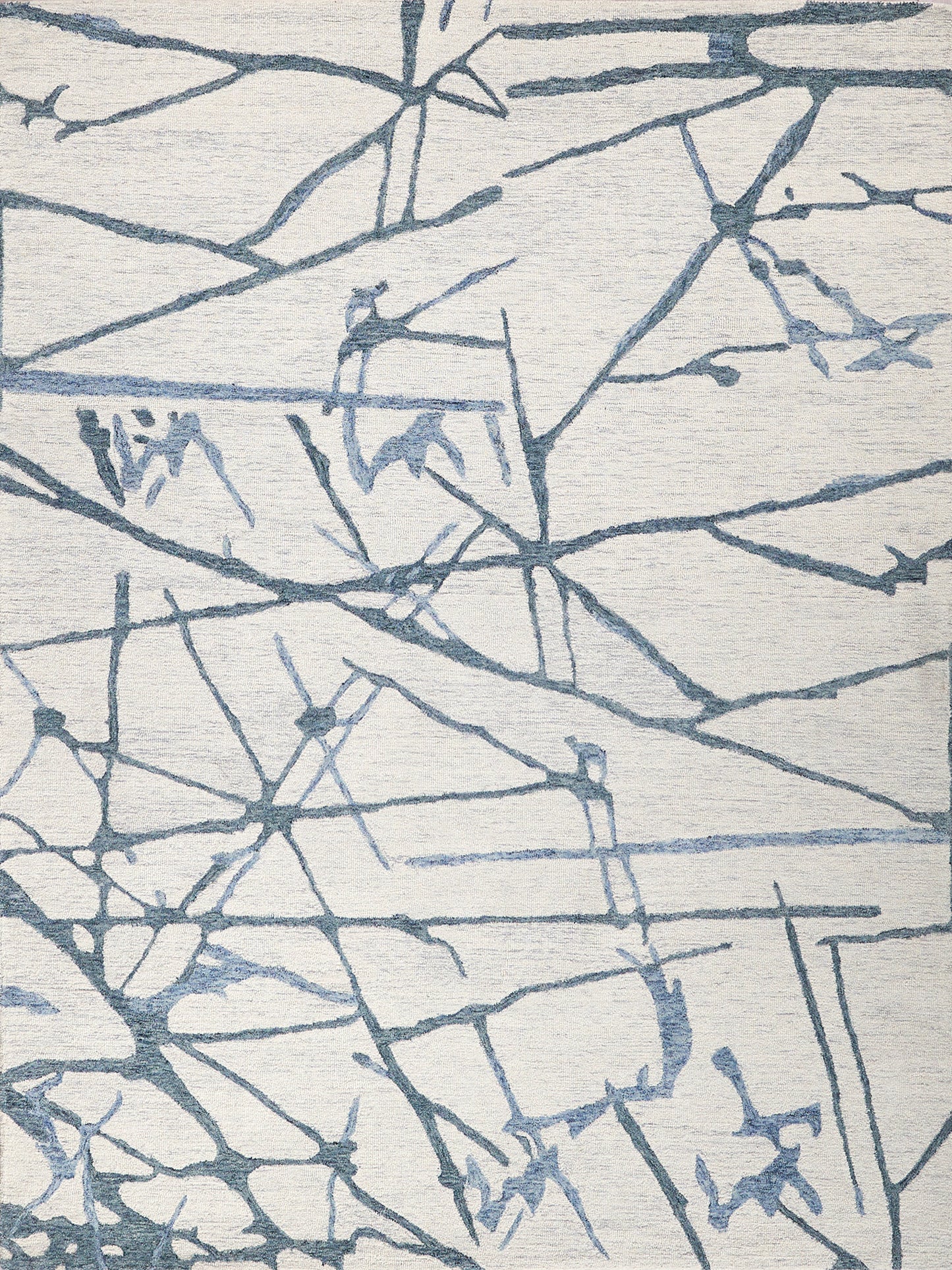 Abstract blue twig pattern rug on cream-beige woven background; modern textured area rug.