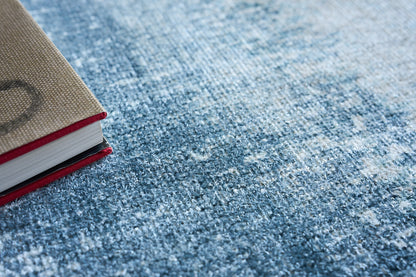 Beige hand-loomed rug with a stone-washed texture, indoor use, 4' x 6'.