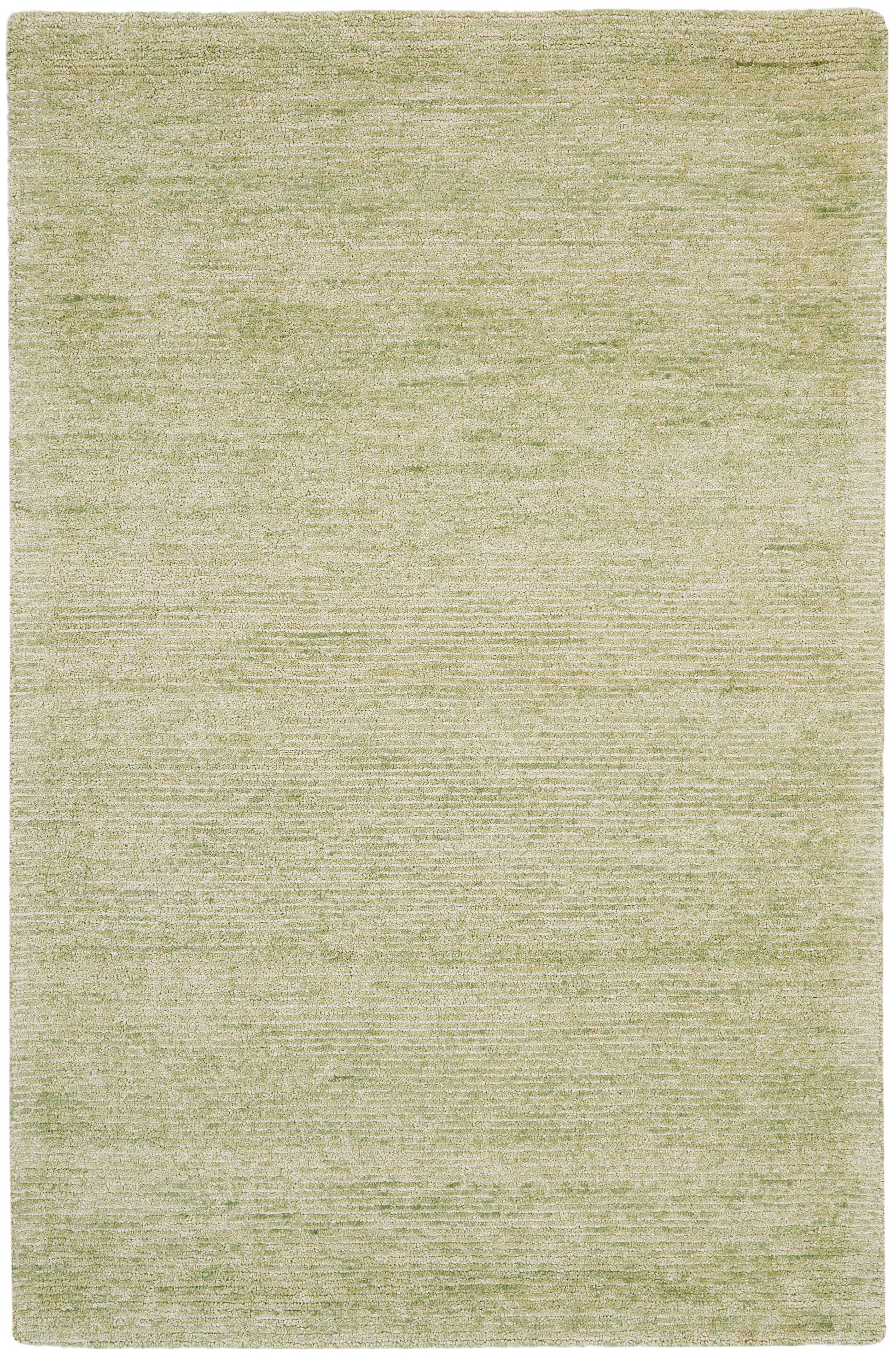 Light olive area rug with subtle heathered texture; rectangular, soft, neutral decor.
