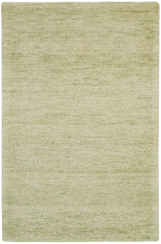 Light olive area rug with subtle heathered texture; rectangular, soft, neutral decor.