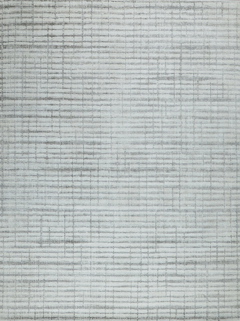 Light gray textured rug with subtle grid lines; modern flat-weave design suitable for living rooms