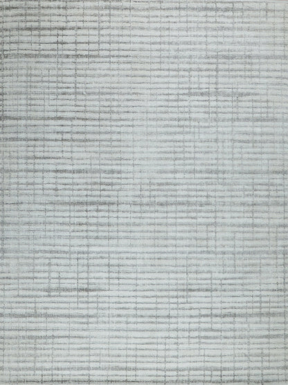 Light gray textured rug with subtle grid lines; modern flat-weave design suitable for living rooms