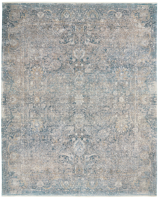 Distressed blue-gray oriental rug with faded central medallion and ornate border details.
