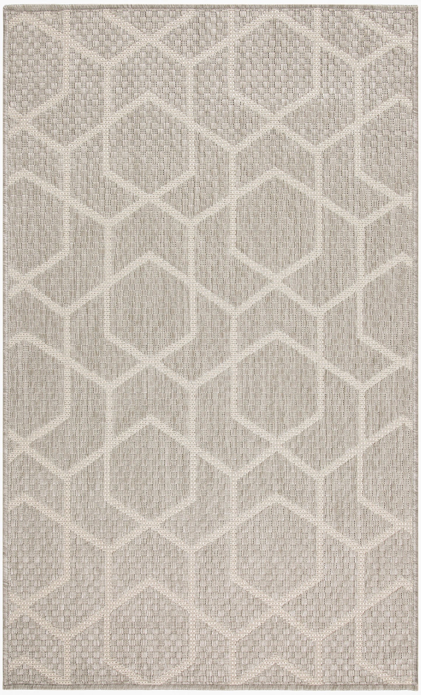Neutral beige area rug with a raised hexagonal-diamond pattern and textured woven surface.