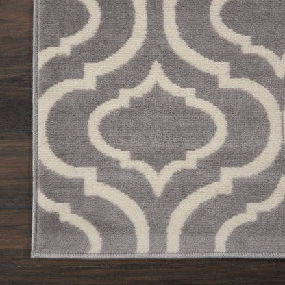 Gray 7' runner rug with a white trellis geometric pattern; modern indoor rug.