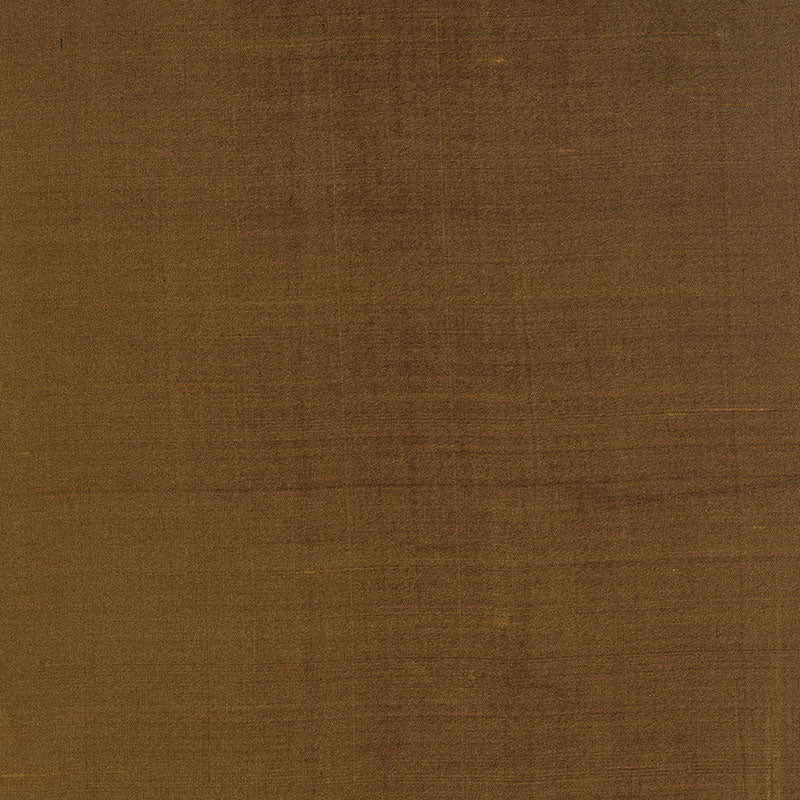 Brown linen-textured fabric swatch with coarse weave, warm rustic upholstery or crafts material.