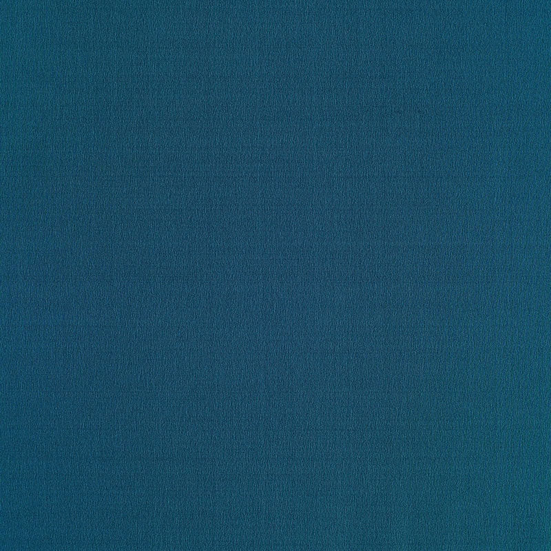 Teal peacock fabric texture close-up; woven textile swatch for upholstery or crafts.