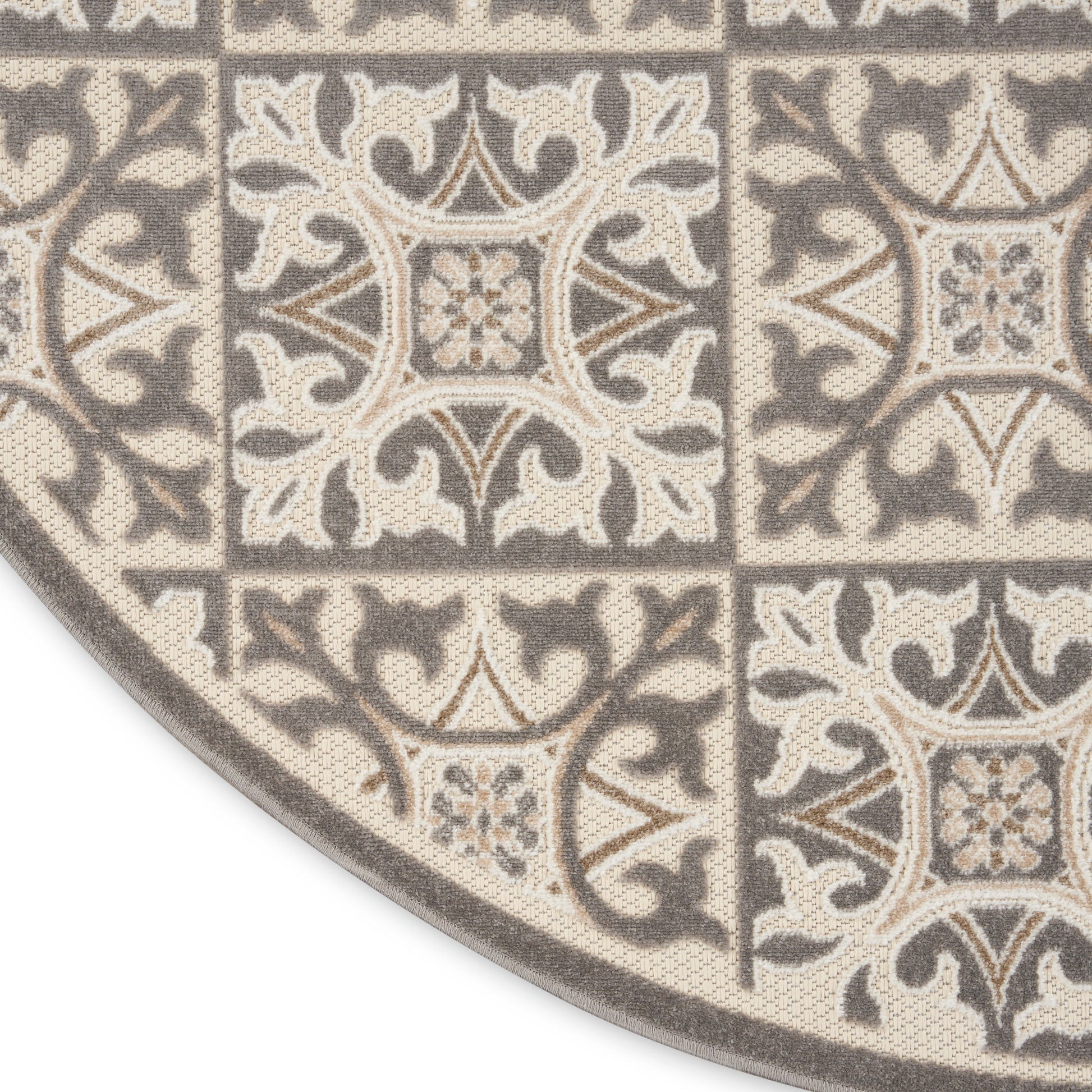 Round rug in gray & beige with damask tile medallion pattern, woven texture, contemporary style.