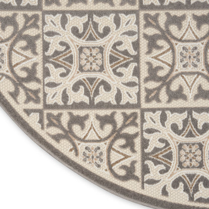 Round rug in gray & beige with damask tile medallion pattern, woven texture, contemporary style.