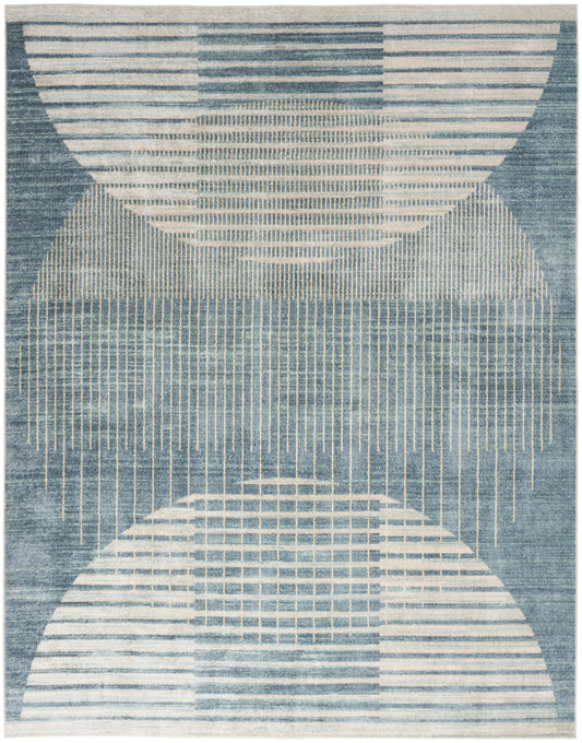 Blue and cream abstract area rug with semicircular arcs, vertical fringe lines and striped segments in a mid-century modern design.