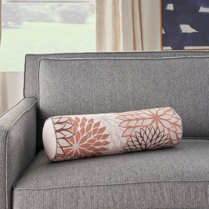 Grey fabric sofa with a cylindrical bolster pillow featuring mandala-style peach and brown floral pattern.