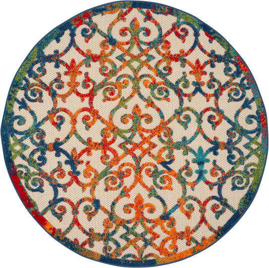 Round decorative rug with multicolor orange, teal, blue and green arabesque lattice pattern on cream, bordered in dark blue.
