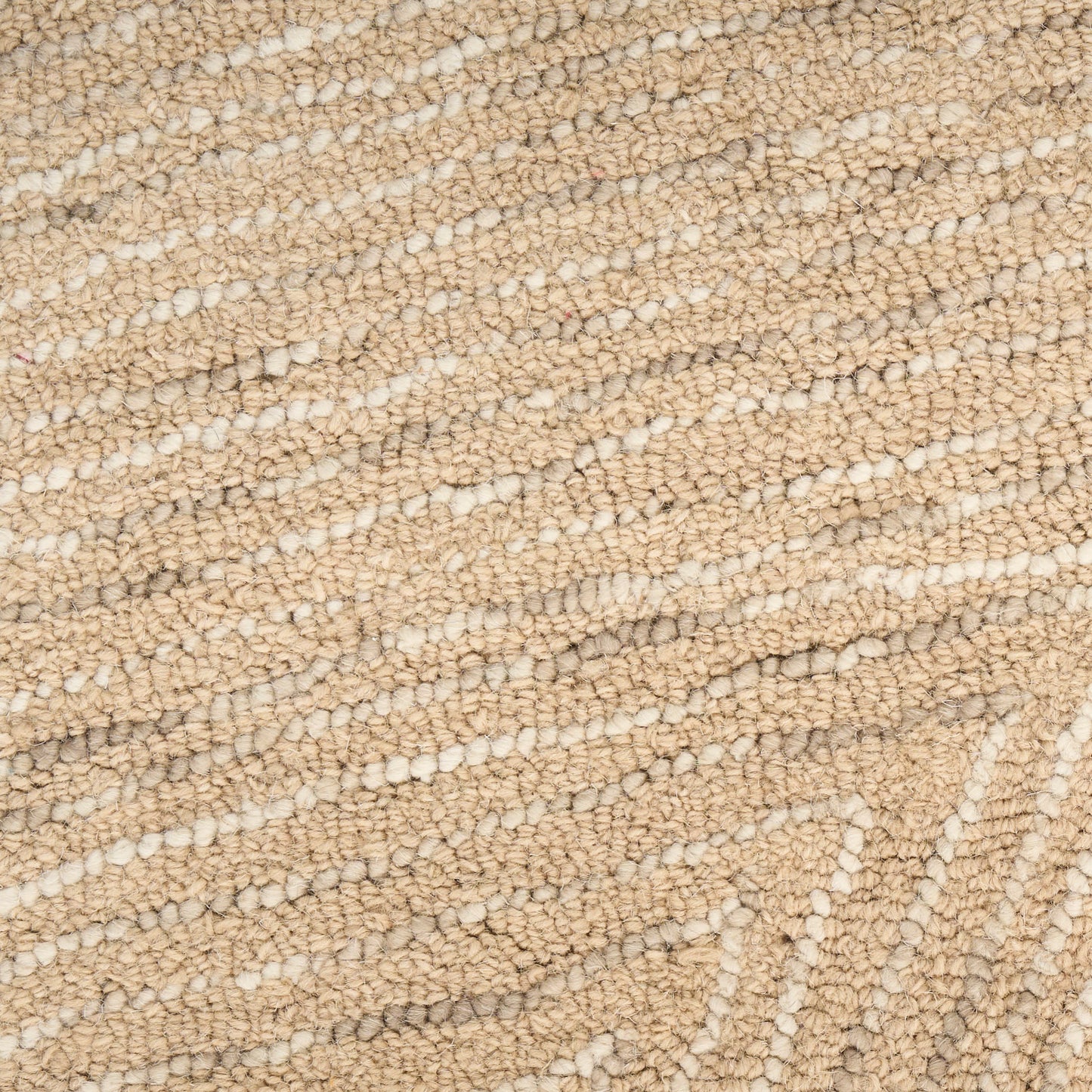 Beige loop-pile carpet close-up with a subtle geometric pattern; soft, durable home flooring.