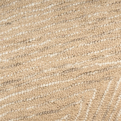 Beige loop-pile carpet close-up with a subtle geometric pattern; soft, durable home flooring.