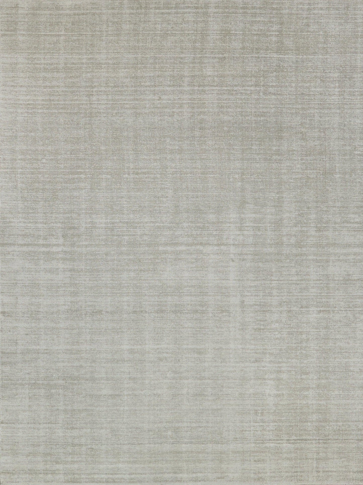 Beige-gray textured rug with linen-like weave; indoor hand-loomed rug, 6' x 9'.