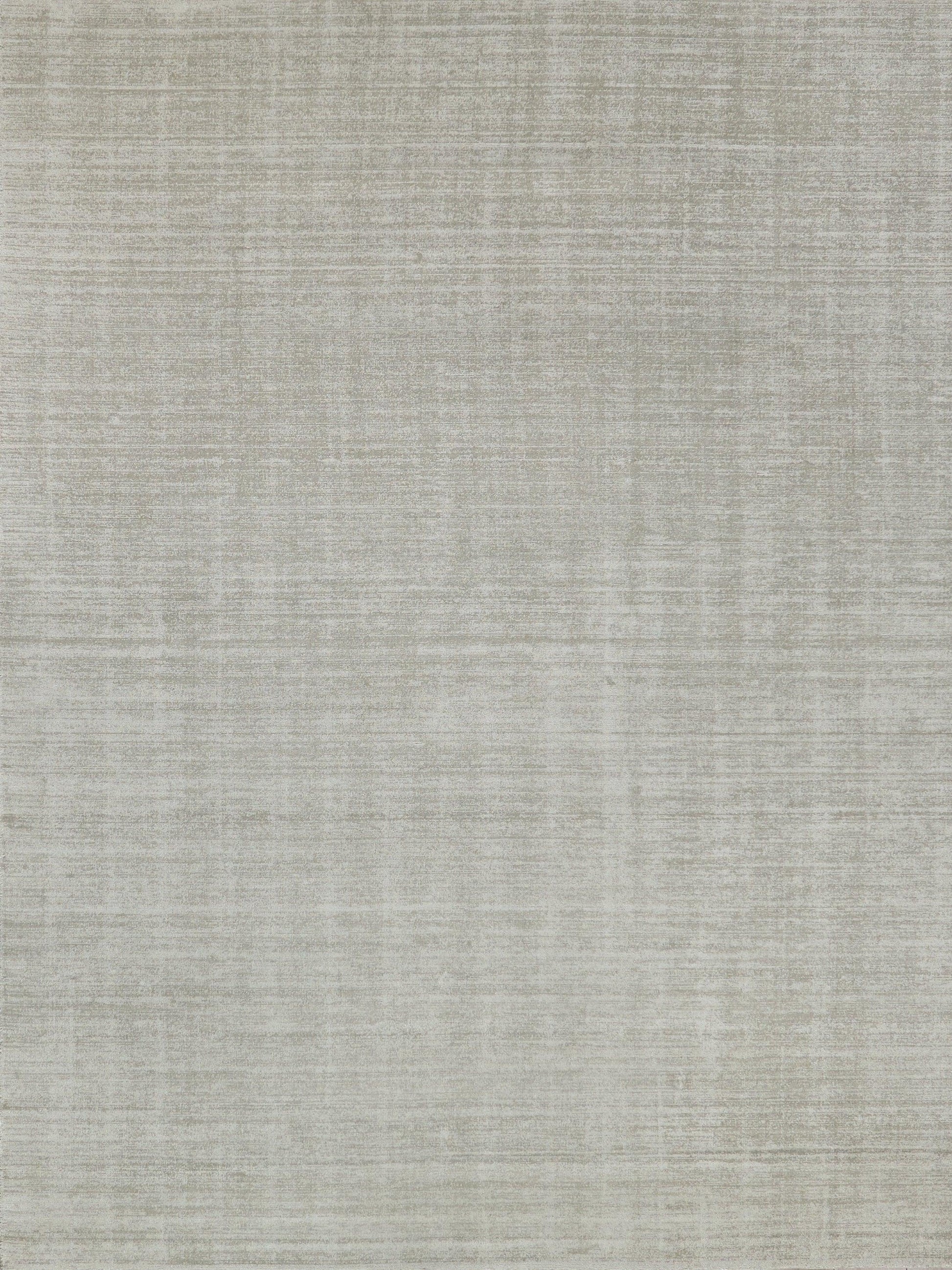 Beige-gray textured rug with linen-like weave; indoor hand-loomed rug, 6' x 9'.