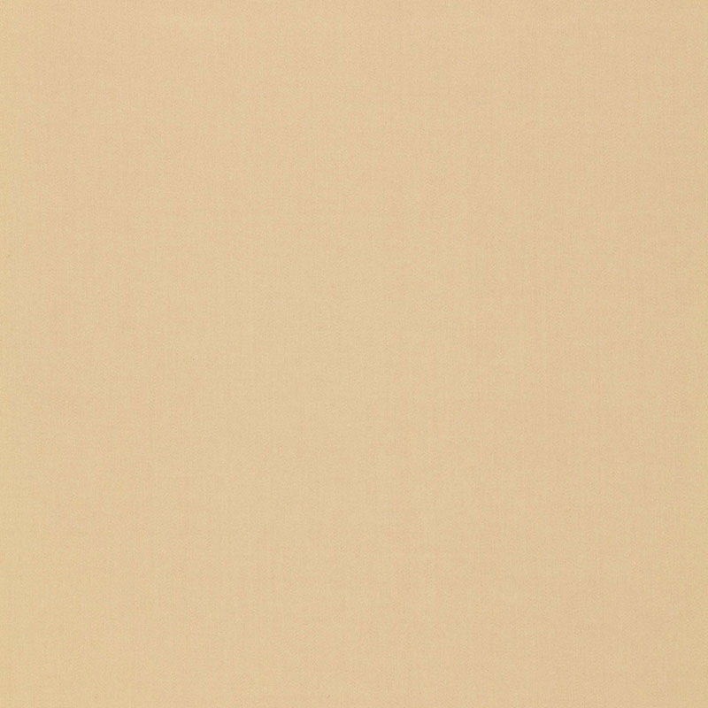 Peachy beige solid fabric background with smooth texture