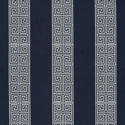 Navy fabric with three vertical white Greek-key meander stripes, geometric upholstery textile.