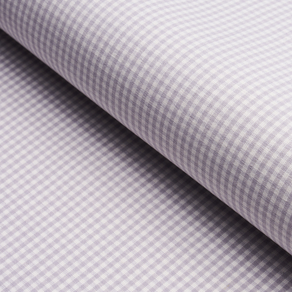 Lilac-and-white gingham cotton fabric, folded roll with tiny checks, ideal for shirts and crafts.