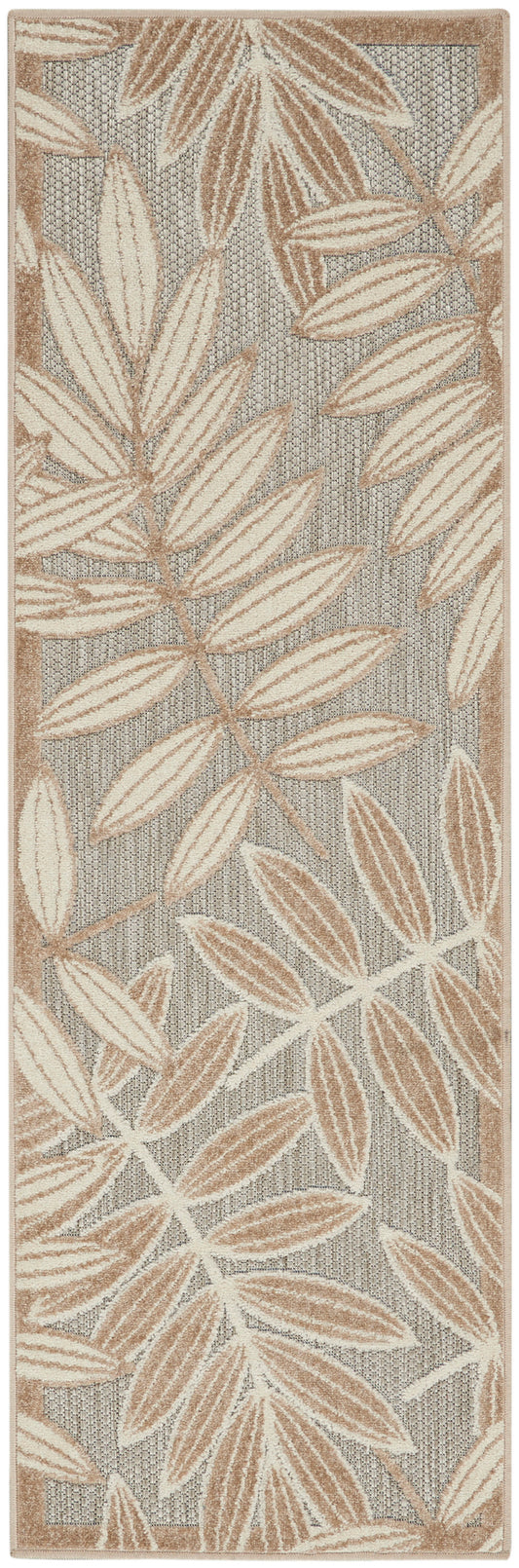 Long runner rug with tan and beige palm-leaf motifs on a gray woven backdrop.