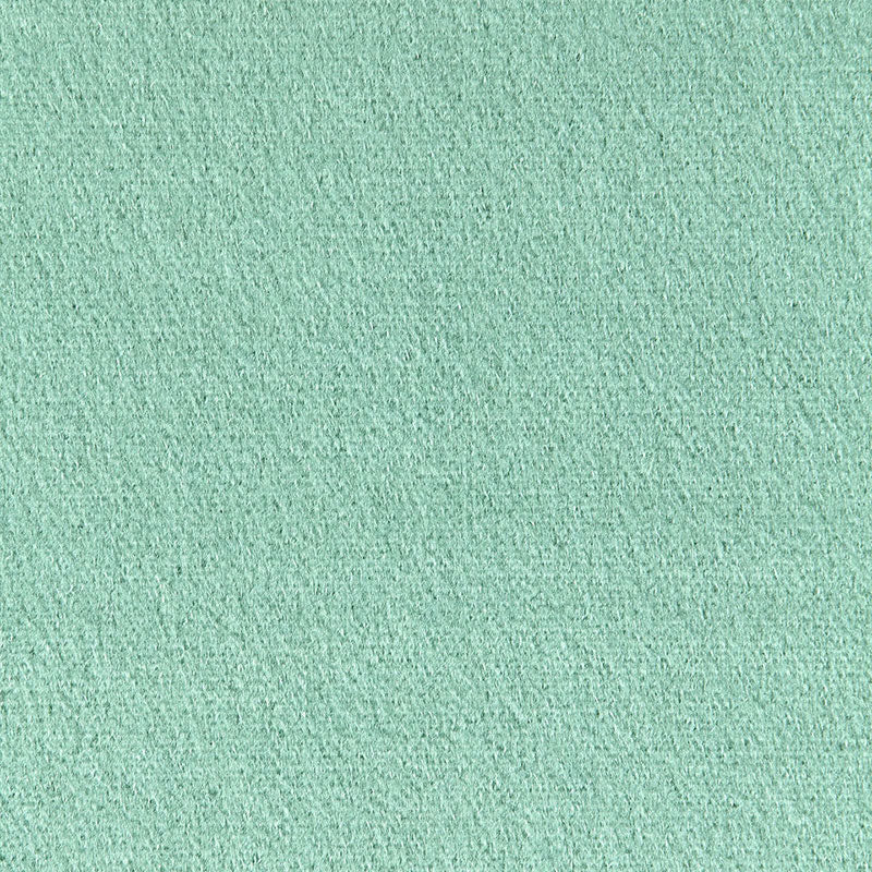Mint green suede-like fabric texture close-up, soft velvety microfiber material.