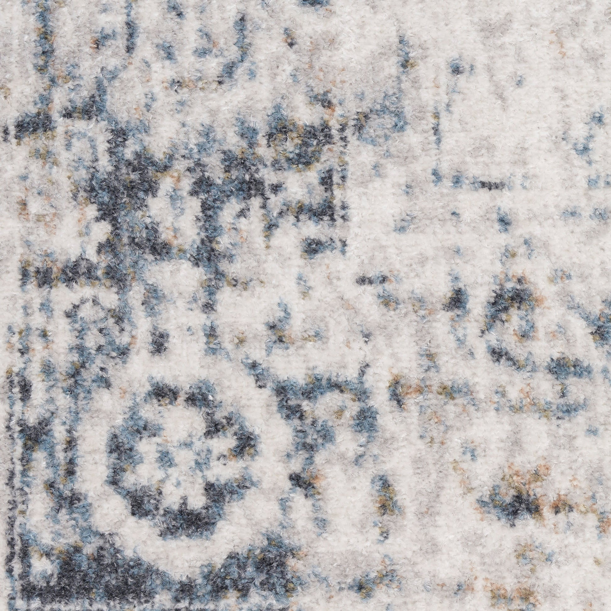 Ivory and blue-gray distressed area rug with faded medallion pattern; plush pile, rectangular living room rug.