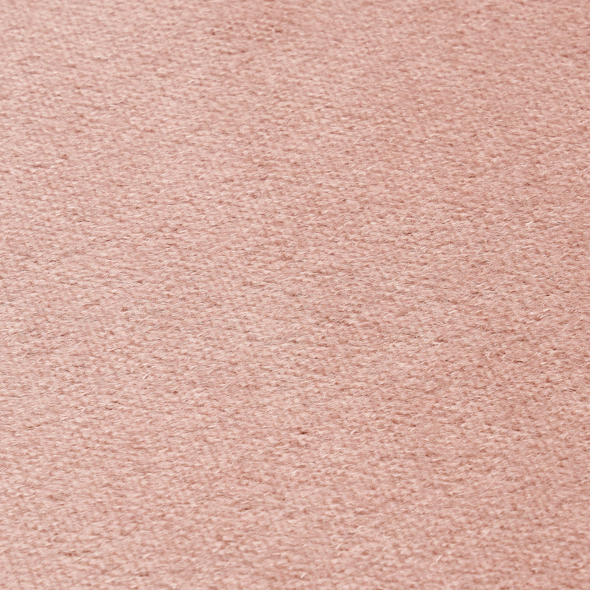Dusty rose mohair velvet close-up with soft nap.