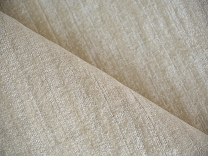 Beige textured woven rug with subtle sheen; hand loomed indoor rug, 6' x 9'.