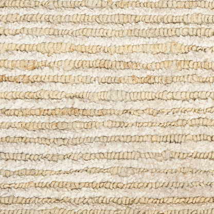Beige and cream textured woven rug with chunky loop strands; natural jute/sisal look for neutral living spaces.