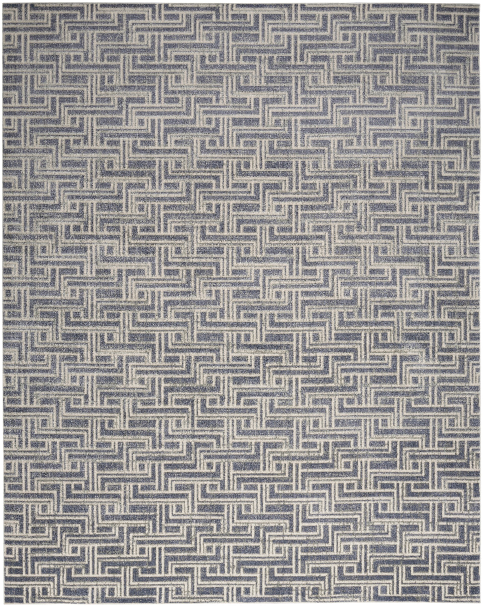 Blue and cream woven rug with a repeated interlocking meander pattern.