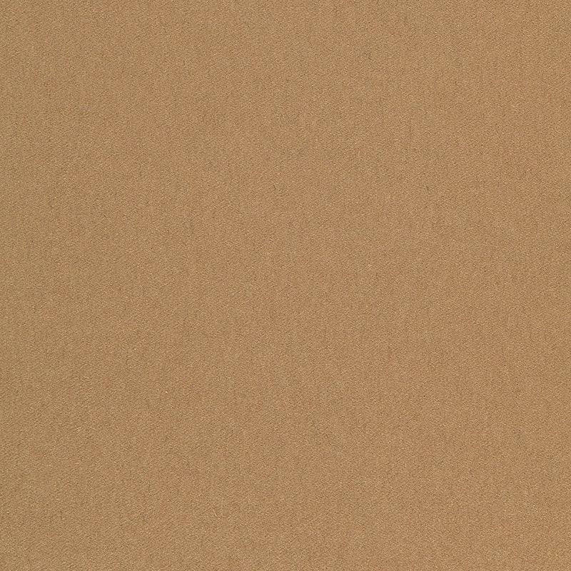 Kraft brown cardboard texture close-up with visible fibers.