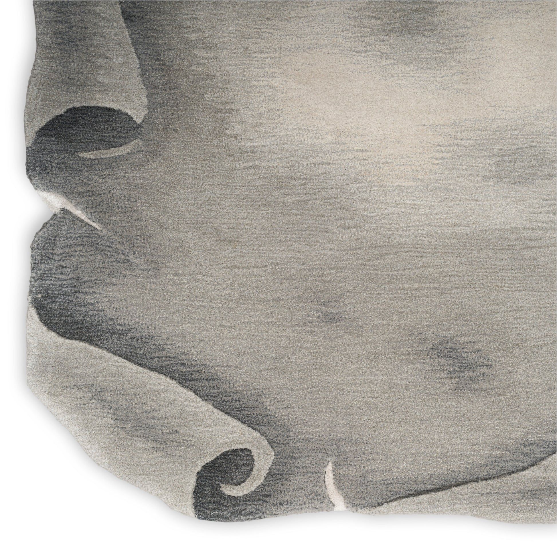 Grey linen-like textured rug in a soft neutral tone.
