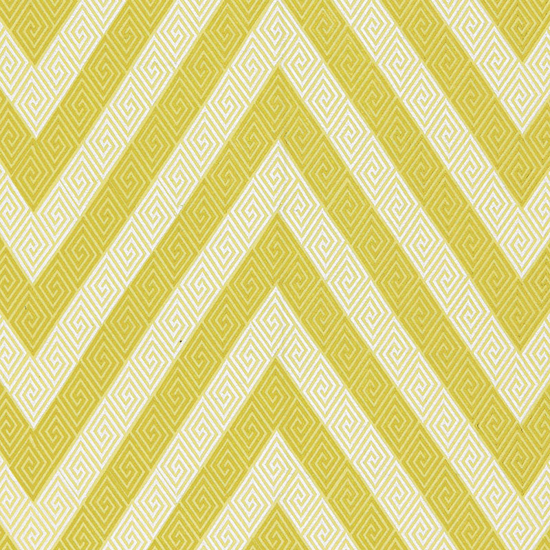Yellow and white chevron striped fabric with Greek key motifs, a geometric retro textile for upholstery or decor