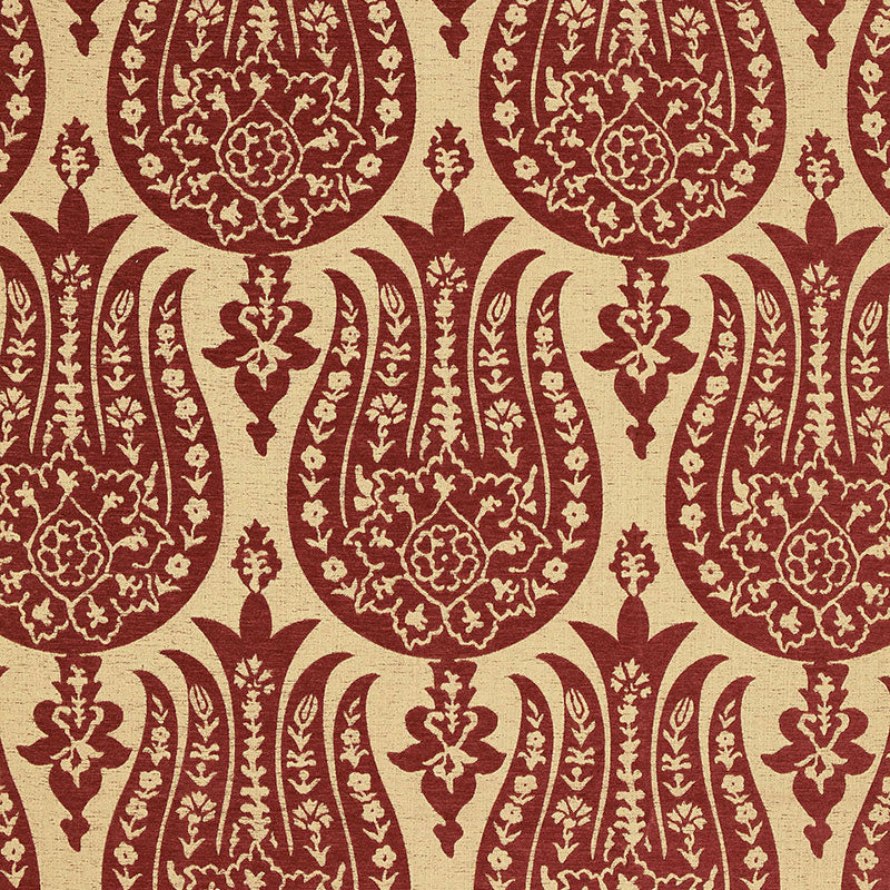 Beige fabric with maroon paisley-damask pattern and floral motifs; classic textile for upholstery or drapery.