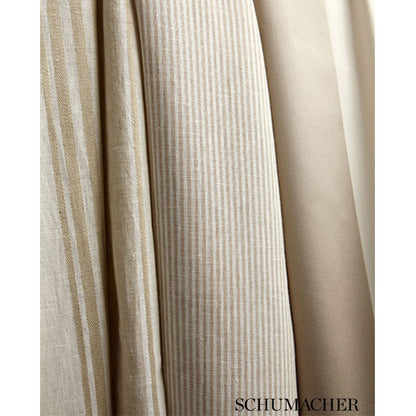 Beige fabric swatches with striped and solid textures in varying shades, Schumacher logo at bottom.