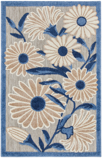Rectangular woven rug with cream daisies, blue centers & leaves on gray background, blue border.