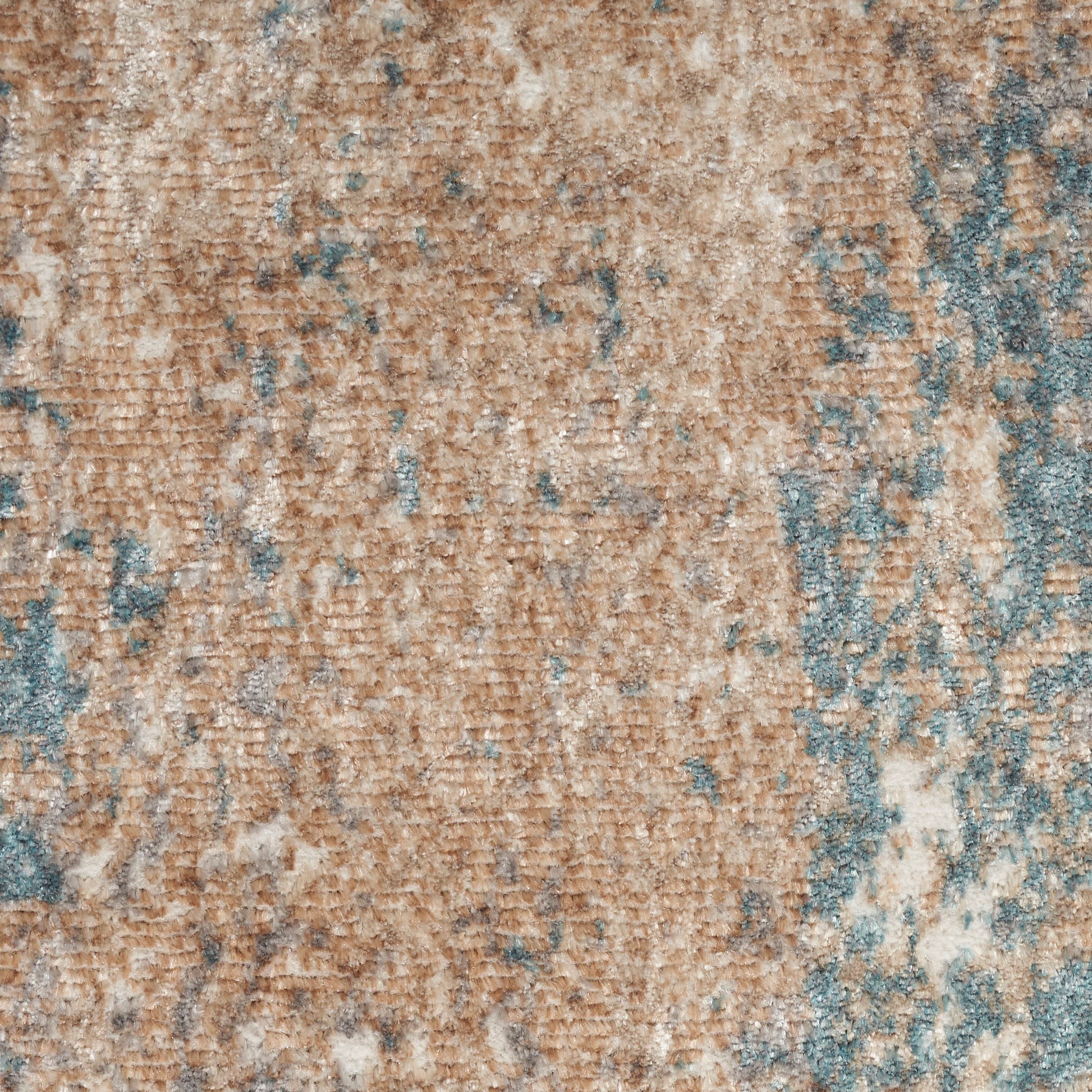 Close-up of a beige and blue abstract patterned 8' runner rug with a distressed texture and soft woven pile.