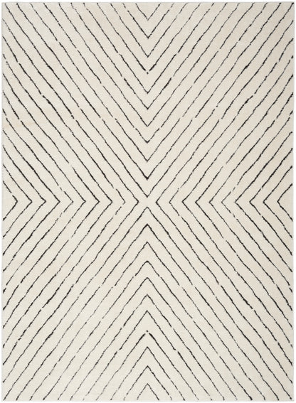 Cream area rug with black chevron lines forming a bold geometric diamond pattern; modern woven style.