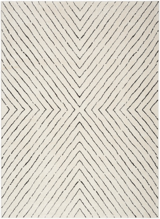 Cream area rug with black chevron lines forming a bold geometric diamond pattern; modern woven style.