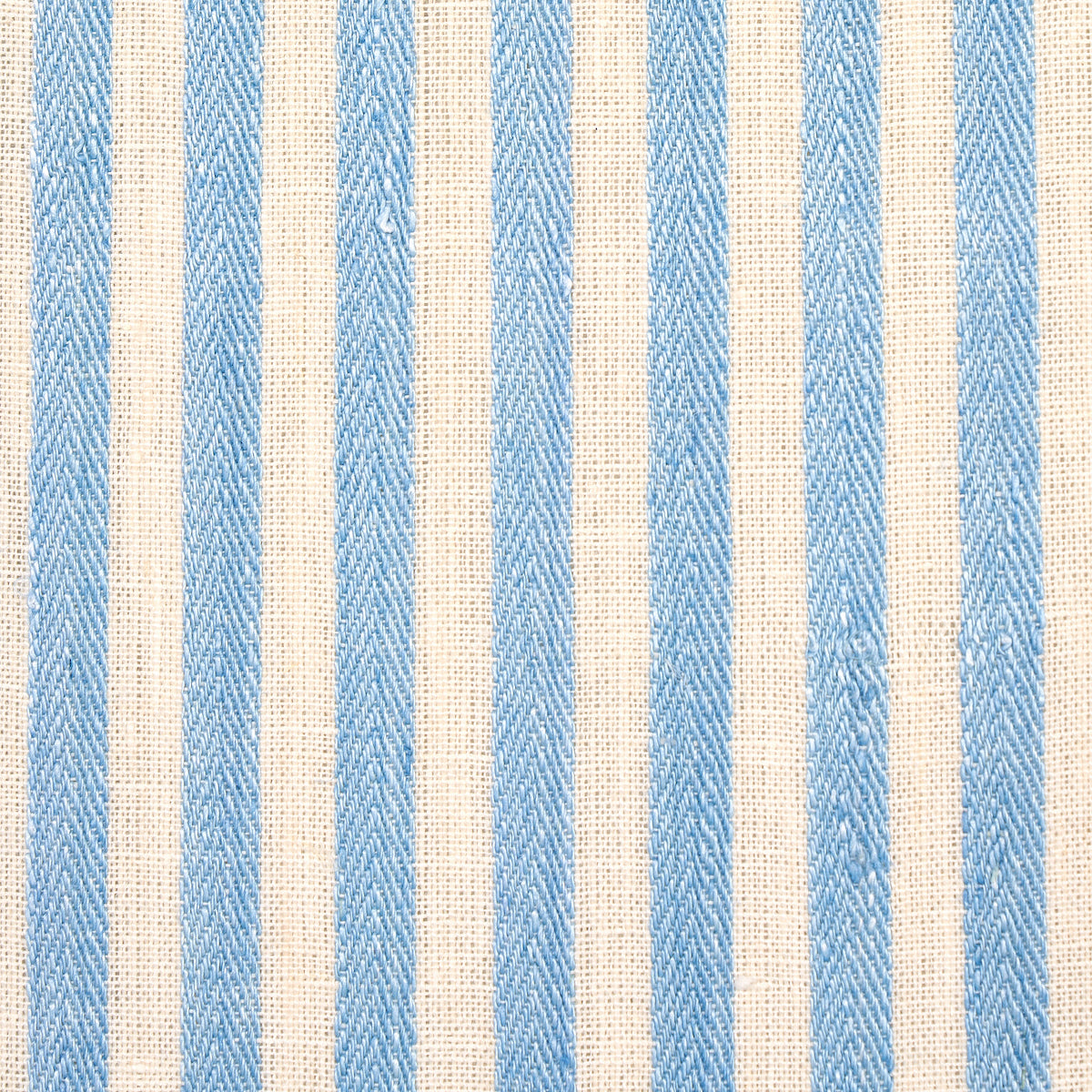 Blue and beige striped woven fabric close-up; textured vertical stripes ideal for upholstery or cushions.