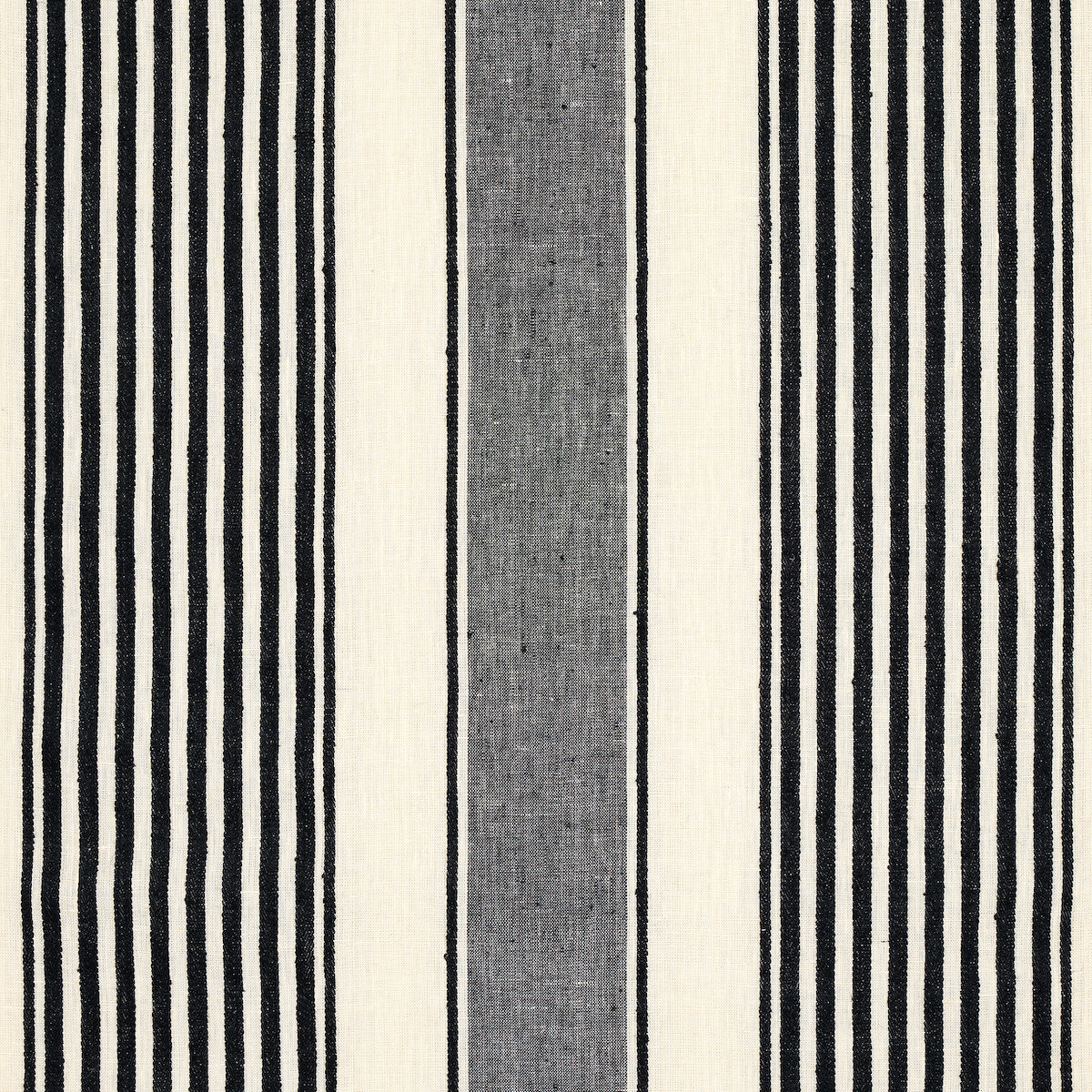 Vertical striped textile with bold black & ivory stripes and a central grey band; woven fabric for rug or upholstery.