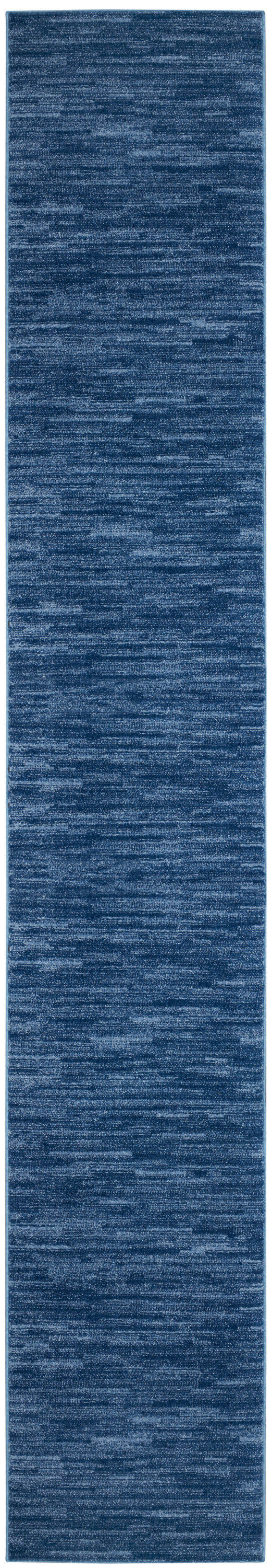 Long navy blue marled outdoor rug runner with subtle horizontal texture.