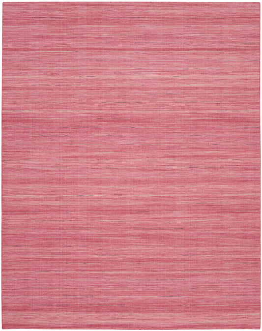 Pink-toned flat-weave area rug with subtle horizontal stripe texture in coral and blush hues.