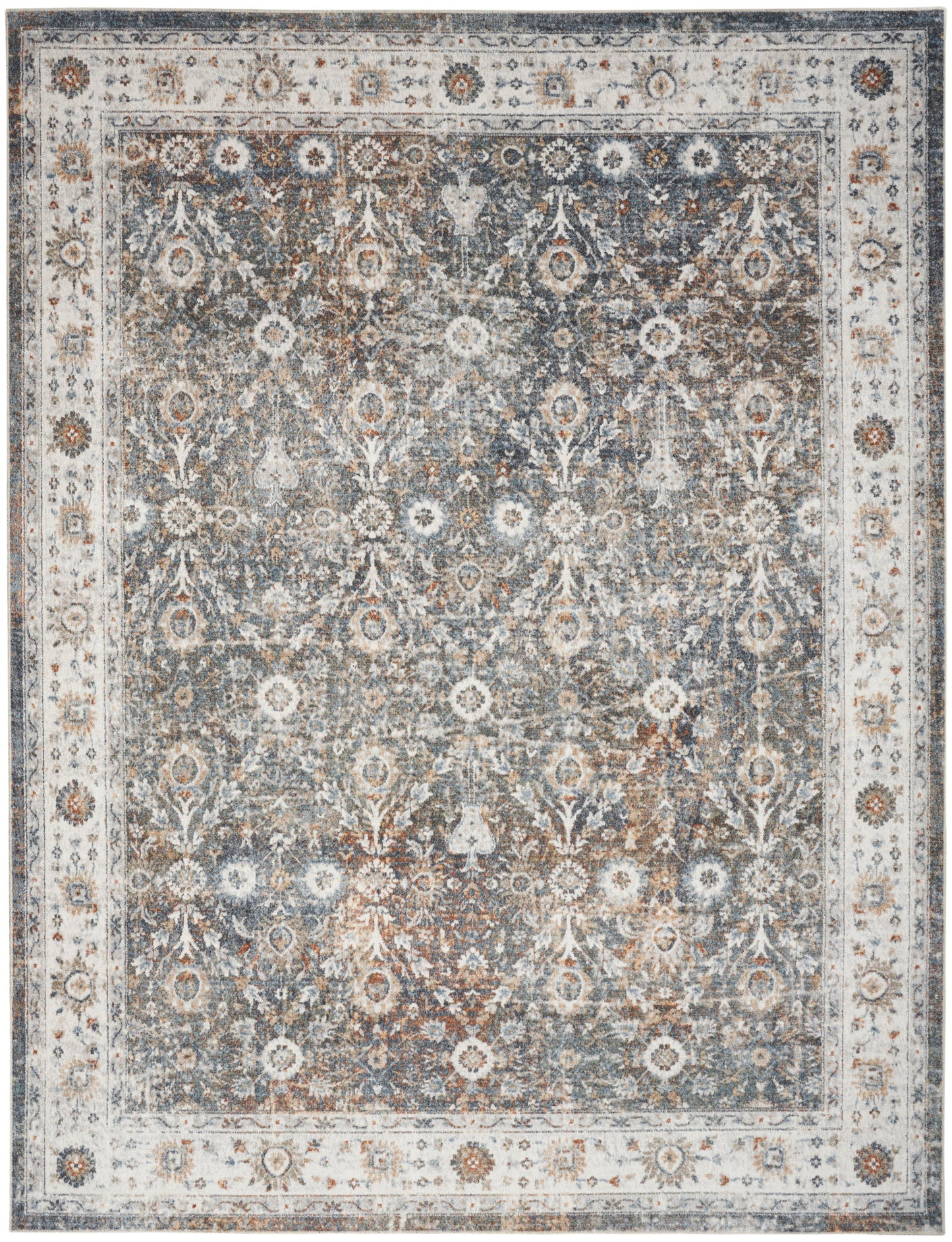 Rectangular distressed Persian-style area rug in blue-gray with ivory border and floral medallion motifs.