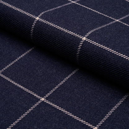 Dark navy fabric with white windowpane grid; folded wool-like textile.