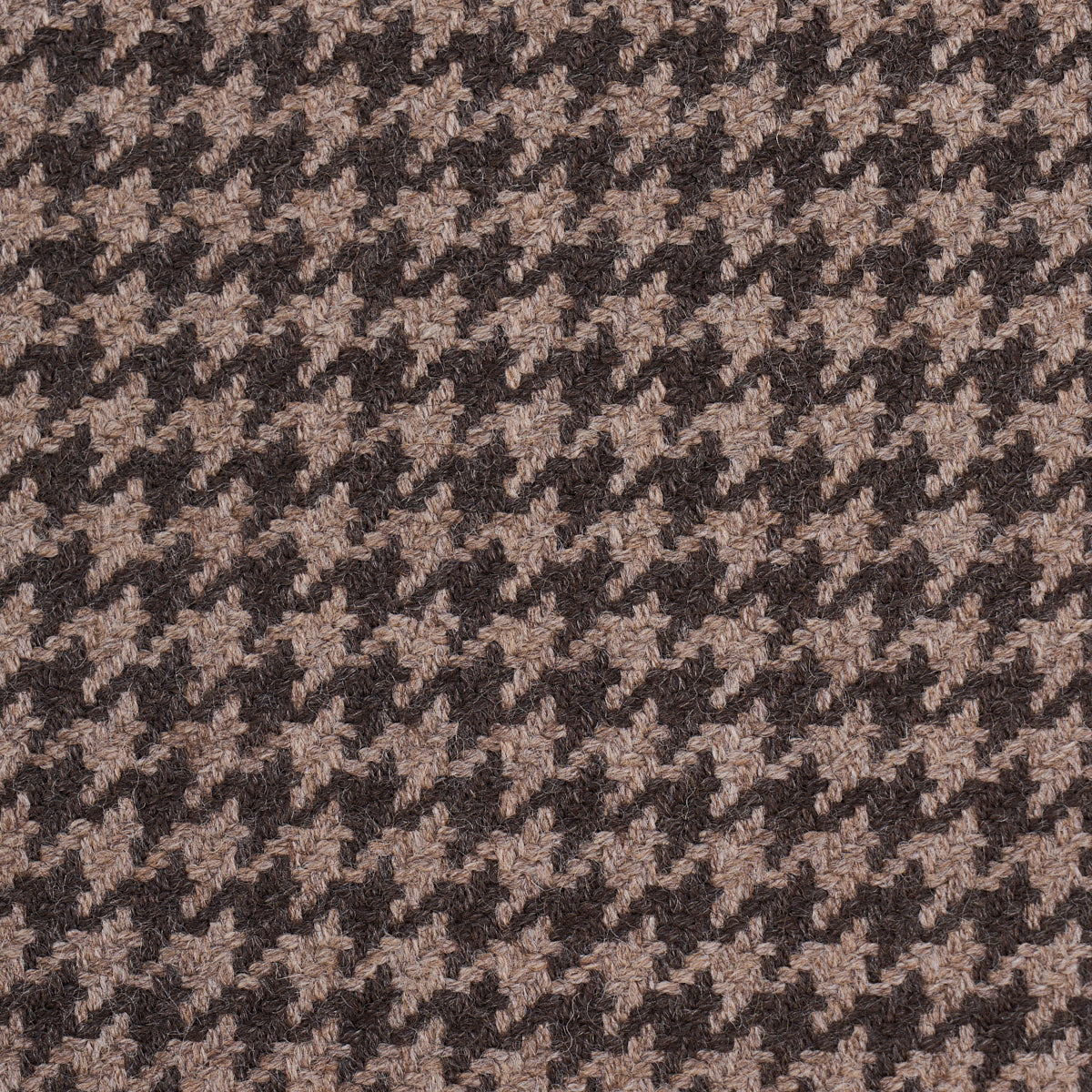 Tan and dark brown houndstooth wool fabric pattern.